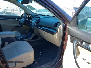 2013 Kia Sorento LX with VIN 5XYKT3A60DG379067, listed as a IAAI auction lot 41613664 with 142,651 mi miles and . Bid and sale history available at carsss.com. Image 5.