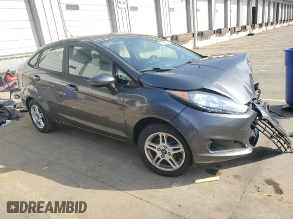 2019 Ford Fiesta SE z VIN 3FADP4BJ5KM146863, wystawiony jako Copart lot #52404965 z przebiegiem 61 286 mil mil oraz Szkoda całkowita • Salvage title. Historia ofert i sprzedaży dostępna na DreamBid. Obrazek 4.