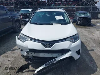 2017 Toyota RAV4 LE with VIN JTMBFREV8HJ700774, listed as a IAAI auction lot 42439345 with 96,907 mi miles and . Bid and sale history available at DreamBid. Image 12.