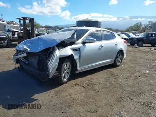 2015 Kia Optima LX z VIN 5XXGM4A74FG476636, wystawiony jako IAAI lot #41242478 z przebiegiem Nie podano mil oraz . Historia ofert i sprzedaży dostępna na DreamBid. Obrazek 19.