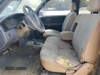 1997 Toyota T100 SR5 with VIN JT4UN24D8V0043620, listed as a Copart auction lot 86747534 with 185,470 mi miles and Salvage Title. Bid and sale history available at DreamBid. Image 7.