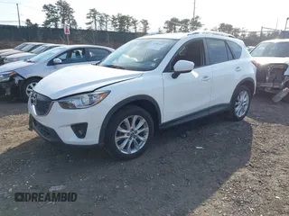 2014 Mazda CX-5 Grand Touring with VIN JM3KE4DY7E0425201, listed as a IAAI auction lot 41803597 with 118,867 mi miles. Bid and sale history available at carsss.com. Image 19.