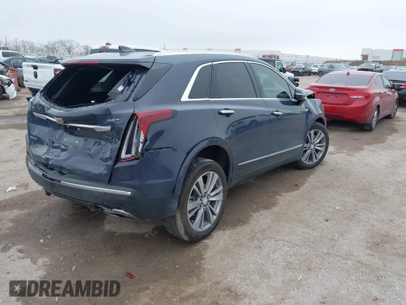 2024 Cadillac XT5 FWD Premium Luxury with VIN 1GYKNCR47RZ755652, listed as a IAAI auction lot 41512069 with 10,243 mi miles. Bid and sale history available at carsss.com. Image 4.
