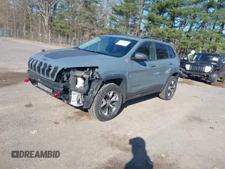 2014 Jeep Cherokee Trailhawk with VIN 1C4PJMBS4EW179763, listed as a IAAI auction lot 41988048 with 152,681 mi miles. Bid and sale history available at carsss.com. Image 18.