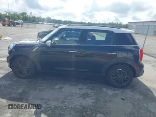 2013 MINI Countryman S z VIN WMWZC3C5XDWP24270, wystawiony jako IAAI lot #42232550 z przebiegiem 95 512 mil mil oraz . Historia ofert i sprzedaży dostępna na DreamBid. Obrazek 14.