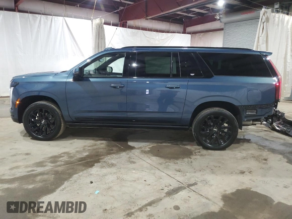 2025 Cadillac Escalade z VIN 1GYS9PRLXSR129201, wystawiony jako Copart lot #59422345 z przebiegiem 775 mil mil oraz Szkoda całkowita • Salvage title. Historia ofert i sprzedaży dostępna na DreamBid. Obrazek 13.