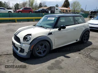 2013 MINI Hardtop with VIN WMWSU3C58DT373021, listed as a Copart auction lot 52945845 with 83,865 mi miles and Salvage Title. Bid and sale history available at DreamBid. Image 1.