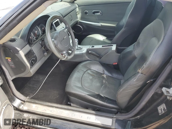 2004 Chrysler Crossfire z VIN 1C3AN69LX4X023972, wystawiony jako Copart lot #49111475 z przebiegiem 208 710 mil mil oraz Szkoda całkowita • Salvage title. Historia ofert i sprzedaży dostępna na DreamBid. Obrazek 7.