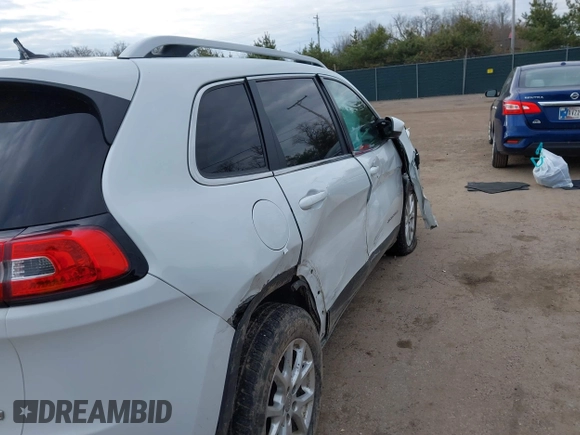 2015 Jeep Cherokee Latitude z VIN 1C4PJMCS9FW625521, wystawiony jako IAAI lot #41894602 z przebiegiem 112 865 mil mil oraz . Historia ofert i sprzedaży dostępna na DreamBid. Obrazek 6.