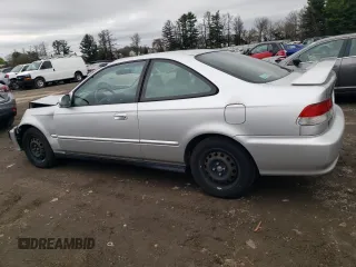 1999 Honda Civic EX z VIN 1HGEJ8242XL042360, wystawiony jako Copart lot #50969175 z przebiegiem 68 734 mil mil oraz Szkoda całkowita • Salvage title. Historia ofert i sprzedaży dostępna na DreamBid. Obrazek 2.