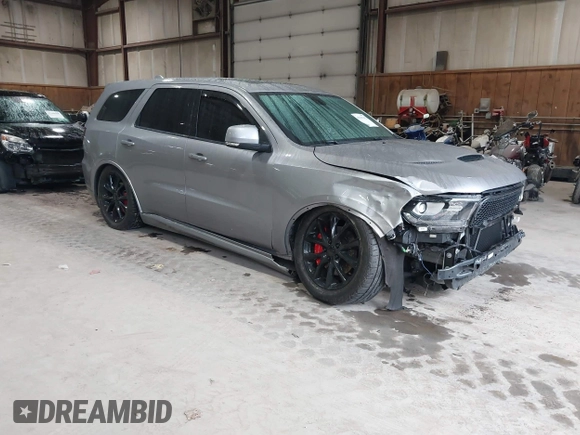 2017 Dodge Durango R/T with VIN 1C4SDJCT0HC799202, listed as a IAAI auction lot 42295142 with 83,103 mi miles and . Bid and sale history available at DreamBid. Image 1.