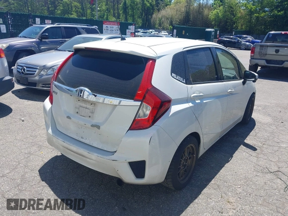 2015 Honda Fit EX z VIN 3HGGK5G84FM733886, wystawiony jako IAAI lot #42298129 z przebiegiem 84 383 mil mil oraz . Historia ofert i sprzedaży dostępna na DreamBid. Obrazek 4.
