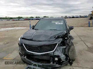 2020 Cadillac XT4 AWD Sport z VIN 1GYFZFR40LF019359, wystawiony jako Copart lot #55651105 z przebiegiem 57 531 mil mil oraz Szkoda całkowita • Salvage title. Historia ofert i sprzedaży dostępna na DreamBid. Obrazek 14.
