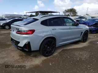2022 BMW X4 M z VIN 5YM23EC08N9J85904, wystawiony jako Copart lot #41979823 z przebiegiem Nie podano mil oraz . Historia ofert i sprzedaży dostępna na DreamBid. Obrazek 3.