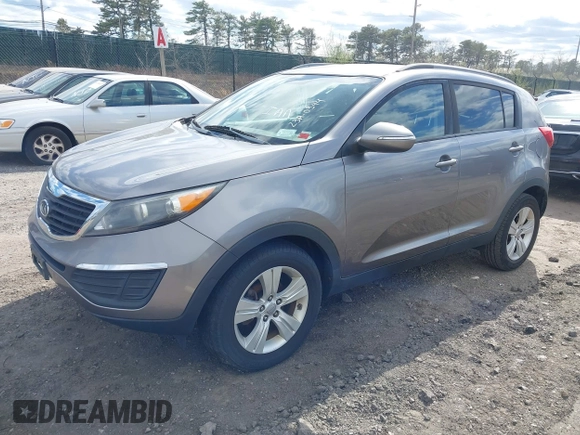 2011 Kia Sportage LX with VIN KNDPB3A21B7140790, listed as a IAAI auction lot 41995888 with 77,678 mi miles and . Bid and sale history available at carsss.com. Image 2.
