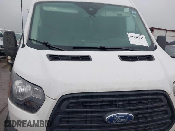 2019 Ford Transit with VIN 1FTYE1CM0KKB38525, listed as a IAAI auction lot 41940711 with 224,576 mi miles and . Bid and sale history available at DreamBid. Image 6.