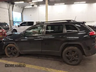 2016 Jeep Cherokee Latitude with VIN 1C4PJMCS3GW197351, listed as a IAAI auction lot 40967948 with 145,051 mi miles and . Bid and sale history available at carsss.com. Image 14.