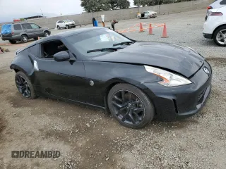 2015 Nissan 370Z with VIN JN1AZ4EH8FM444456, listed as a Copart auction lot 76279024 with 58,513 mi miles and Salvage Title. Bid and sale history available at carsss.com. Image 4.