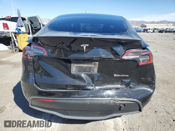 2023 Tesla Model Y Performance with VIN 7SAYGDEF7PF924355, listed as a Copart auction lot 47877055 with 64,663 mi miles and Salvage Title. Bid and sale history available at DreamBid. Image 6.