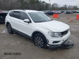 2020 Volkswagen Tiguan SE with VIN 3VV3B7AX2LM055418, listed as a IAAI auction lot 41248422 with Not Provided miles and . Bid and sale history available at DreamBid. Image 1.