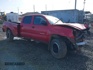 2015 Toyota Tacoma with VIN 3TMMU4FN1FM077045, listed as a IAAI auction lot 41670552 with 118,983 mi miles and . Bid and sale history available at DreamBid. Image 1.