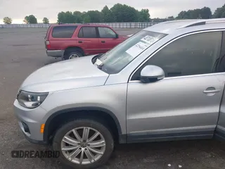 2012 Volkswagen Tiguan SE z VIN WVGAV7AX4CW520340, wystawiony jako IAAI lot #42294414 z przebiegiem 120 009 mil mil oraz . Historia ofert i sprzedaży dostępna na DreamBid. Obrazek 14.