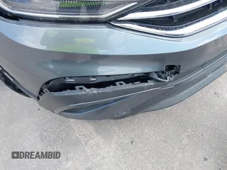 2023 Volkswagen Tiguan SE z VIN 3VVNB7AX5PM064693, wystawiony jako IAAI lot #42033011 z przebiegiem 38 220 mil mil oraz . Historia ofert i sprzedaży dostępna na DreamBid. Obrazek 6.