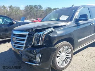 2016 Cadillac Escalade Platinum with VIN 1GYS4DKJ3GR217116, listed as a IAAI auction lot 41679348 with 122,811 mi miles. Bid and sale history available at carsss.com. Image 6.