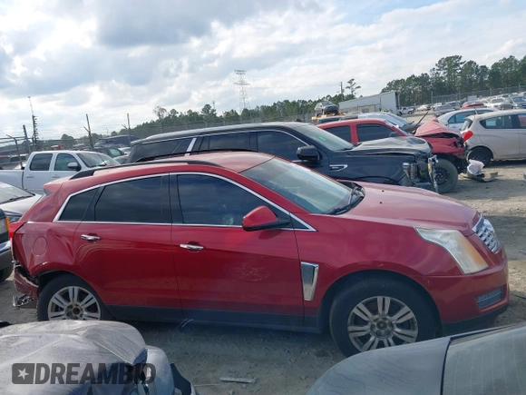 2015 Cadillac SRX z VIN 3GYFNAE3XFS572970, wystawiony jako IAAI lot #40854902 z przebiegiem 124 779 mil mil oraz . Historia ofert i sprzedaży dostępna na DreamBid. Obrazek 12.