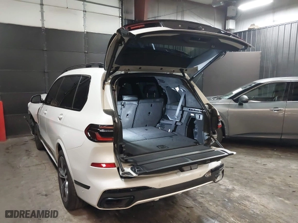2023 BMW X7 xDrive40i with VIN 5UX23EM04P9P96036, listed as a IAAI auction lot 41235512 with 35,661 mi miles. Bid and sale history available at carsss.com. Image 3.
