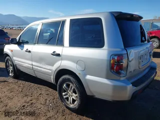 2006 Honda Pilot LX with VIN 2HKYF18156H556689, listed as a IAAI auction lot 40792236 with 273,856 mi miles. Bid and sale history available at carsss.com. Image 3.