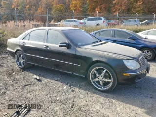 2003 Mercedes-Benz S-Class 5.0L with VIN WDBNG75J13A343070, listed as a Copart auction lot 77412604 with 154,533 mi miles and Salvage Title. Bid and sale history available at carsss.com. Image 4.
