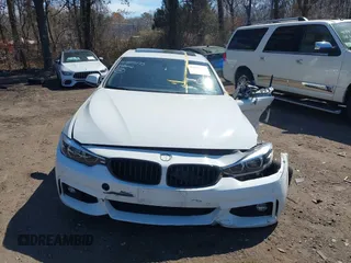 2019 BMW 4 Series 440i xDrive with VIN WBA4J7C58KBM76130, listed as a IAAI auction lot 41885173 with 43,690 mi miles and . Bid and sale history available at carsss.com. Image 11.
