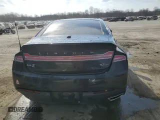 2014 Lincoln MKZ z VIN 3LN6L2JK1ER801584, wystawiony jako Copart lot #49283495 z przebiegiem 93 161 mil mil oraz Szkoda całkowita • Salvage title. Historia ofert i sprzedaży dostępna na DreamBid. Obrazek 6.