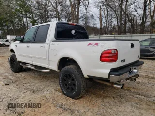 2002 Ford F-150 XLT with VIN 1FTRW08682KC80529, listed as a Copart auction lot 37546994 with 159,980 mi miles and Salvage Title. Bid and sale history available at carsss.com. Image 2.