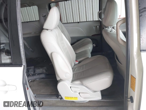 2014 Toyota Sienna XLE with VIN 5TDYK3DC6ES444121, listed as a IAAI auction lot 42110190 with 240,366 mi miles and . Bid and sale history available at DreamBid. Image 8.