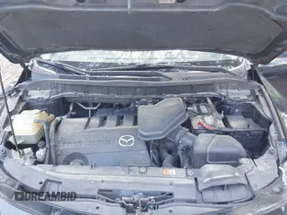 2014 Mazda CX-9 Touring with VIN JM3TB3CV1E0428688, listed as a IAAI auction lot 42052151 with 208,050 mi miles and . Bid and sale history available at DreamBid. Image 10.