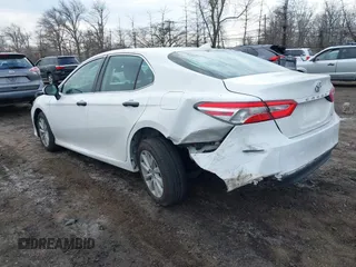 2020 Toyota Camry LE with VIN 4T1C11AK9LU912585, listed as a IAAI auction lot 41711816 with 142,751 mi miles. Bid and sale history available at carsss.com. Image 3.