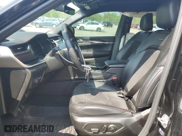 2022 Jeep Grand Cherokee Trailhawk with VIN 1C4RJHCG7N8574289, listed as a Copart auction lot 56333165 with 23,522 mi miles and Salvage title. Bid and sale history available at DreamBid. Image 7.