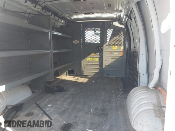 2016 Chevrolet Express Cargo with VIN 1GCWGAFF7G1280009, listed as a IAAI auction lot 41908291 with 148,798 mi miles and . Bid and sale history available at DreamBid. Image 8.