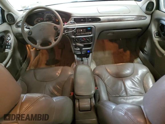 1999 Chevrolet Malibu LS with VIN 1G1NE52M5XY116867, listed as a Copart auction lot 51363475 with 121,874 mi miles and Salvage Title. Bid and sale history available at DreamBid. Image 8.