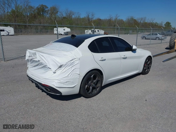 2017 Alfa Romeo Giulia Ti with VIN ZARFAECN0H7560749, listed as a IAAI auction lot 41674283 with 109,678 mi miles. Bid and sale history available at carsss.com. Image 4.