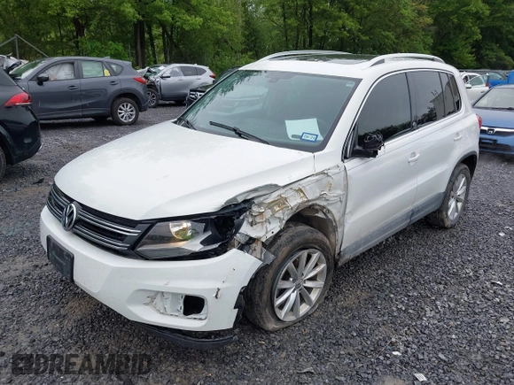 2017 Volkswagen Tiguan Wolfsburg Edition with VIN WVGRV7AX9HK002659, listed as a IAAI auction lot 42482438 with 88,841 mi miles and . Bid and sale history available at DreamBid. Image 6.