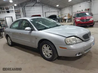 2004 Mercury Sable LS Premium with VIN 1MEFM55S04A628323, listed as a IAAI auction lot 41888634 with 70,725 mi miles. Bid and sale history available at carsss.com. Image 1.