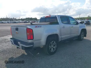 2019 Chevrolet Colorado 2WD Z71 with VIN 1GCGSDEN6K1330906, listed as a IAAI auction lot 40058453 with 116,053 mi miles. Bid and sale history available at carsss.com. Image 4.