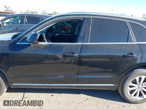 2014 Audi Q5 Premium Plus z VIN WA1LFAFP9EA130988, wystawiony jako IAAI lot #41835596 z przebiegiem 91 303 mil mil oraz . Historia ofert i sprzedaży dostępna na DreamBid. Obrazek 14.