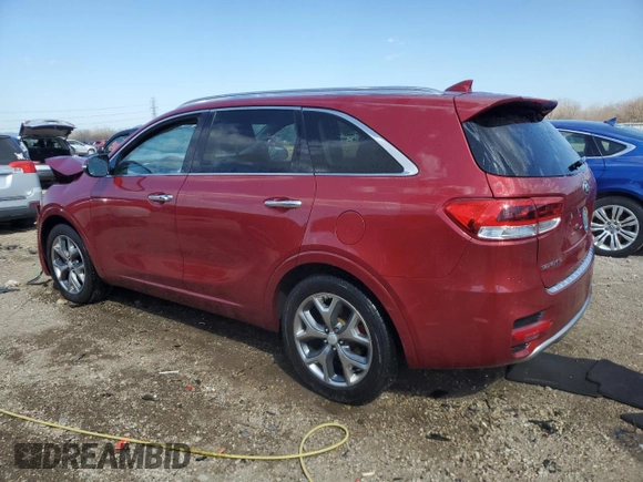 2017 Kia Sorento SX z VIN 5XYPK4A59HG225887, wystawiony jako Copart lot #50325005 z przebiegiem 122 419 mil mil oraz Szkoda całkowita • Salvage title. Historia ofert i sprzedaży dostępna na DreamBid. Obrazek 2.