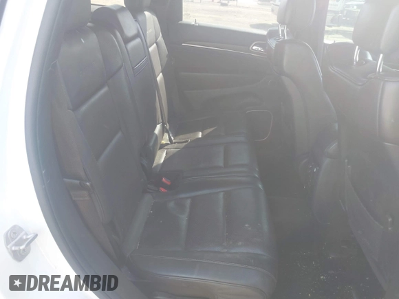 2015 Jeep Grand Cherokee Summit with VIN 1C4RJFJGXFC734025, listed as a IAAI auction lot 41842927 with 137,993 mi miles. Bid and sale history available at carsss.com. Image 8.
