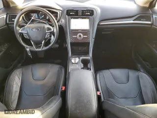 2017 Ford Fusion Energi Titanium with VIN 3FA6P0SUXHR379807, listed as a Copart auction lot 84885494 with 100,735 mi miles and Salvage Title. Bid and sale history available at carsss.com. Image 8.