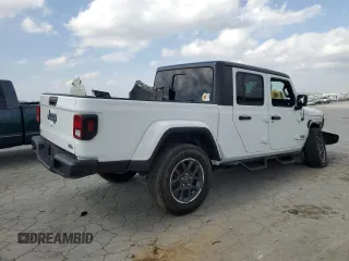 2023 Jeep Gladiator Overland z VIN 1C6HJTFG0PL514615, wystawiony jako Copart lot #48466965 z przebiegiem 32 427 mil mil oraz Czysty tytuł • Clean title. Historia ofert i sprzedaży dostępna na DreamBid. Obrazek 3.